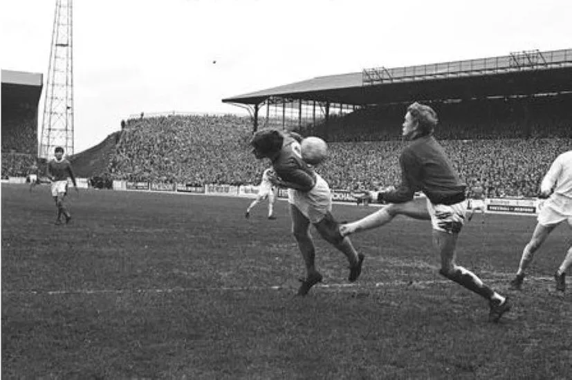 1067 23.11.68 Royle v Leeds (A) Joe Royle dives to head the ball almost out of Gary Sprake's ...webp