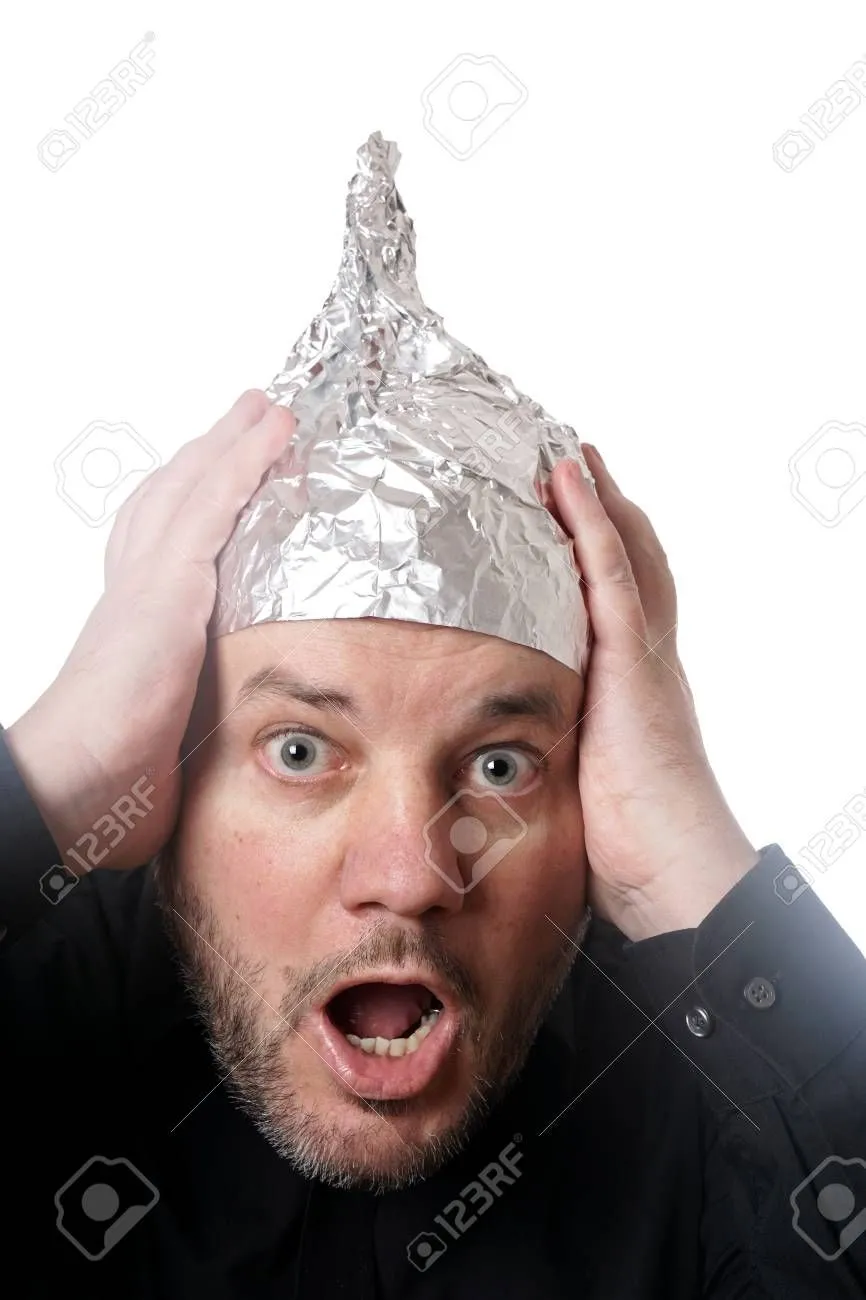 106806681-crazy-scared-man-wearing-tin-foil-hat-paranoia-or-conspiracy-theory-concept.webp