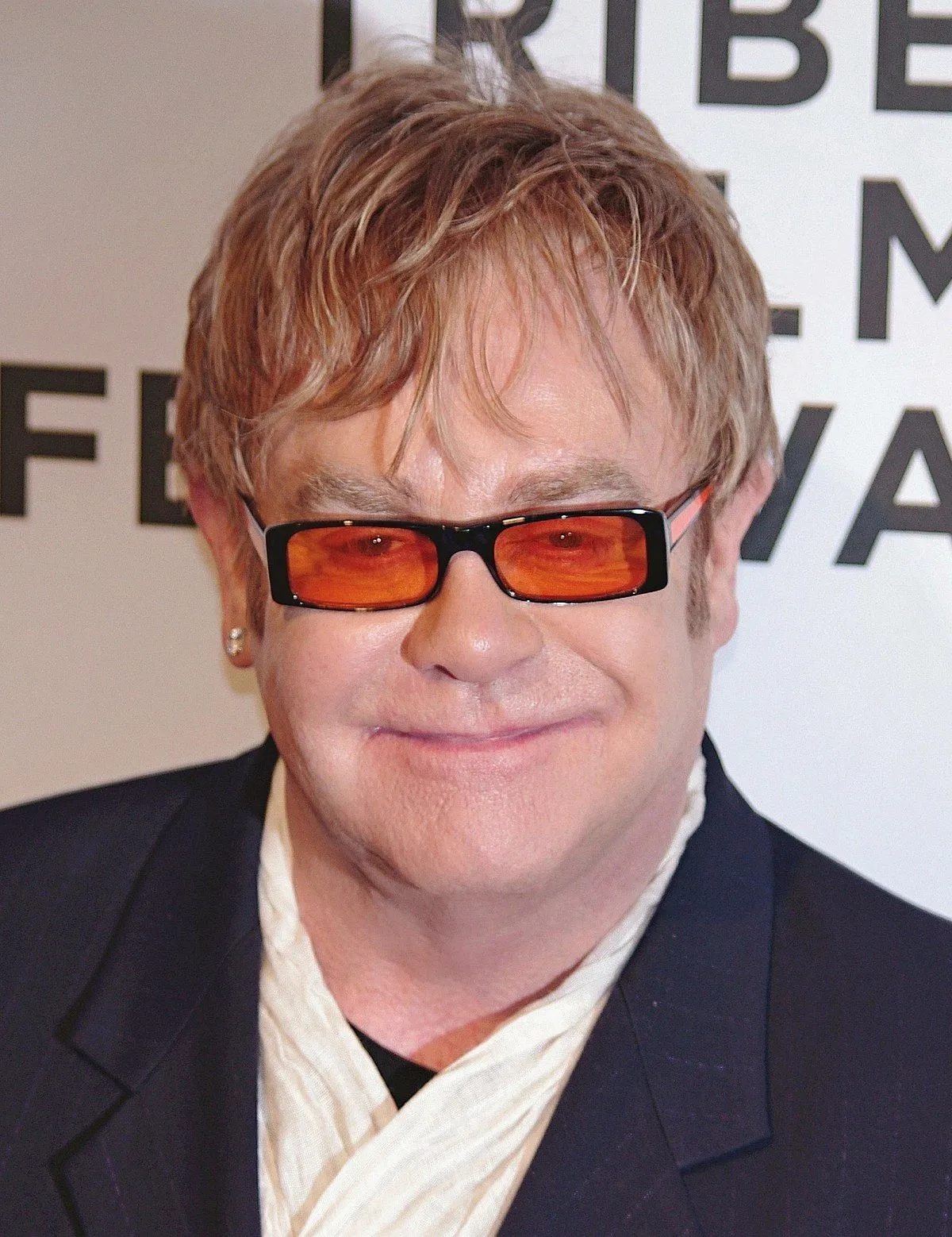 1200px-Elton_John_2011_Shankbone_2_(cropped).webp