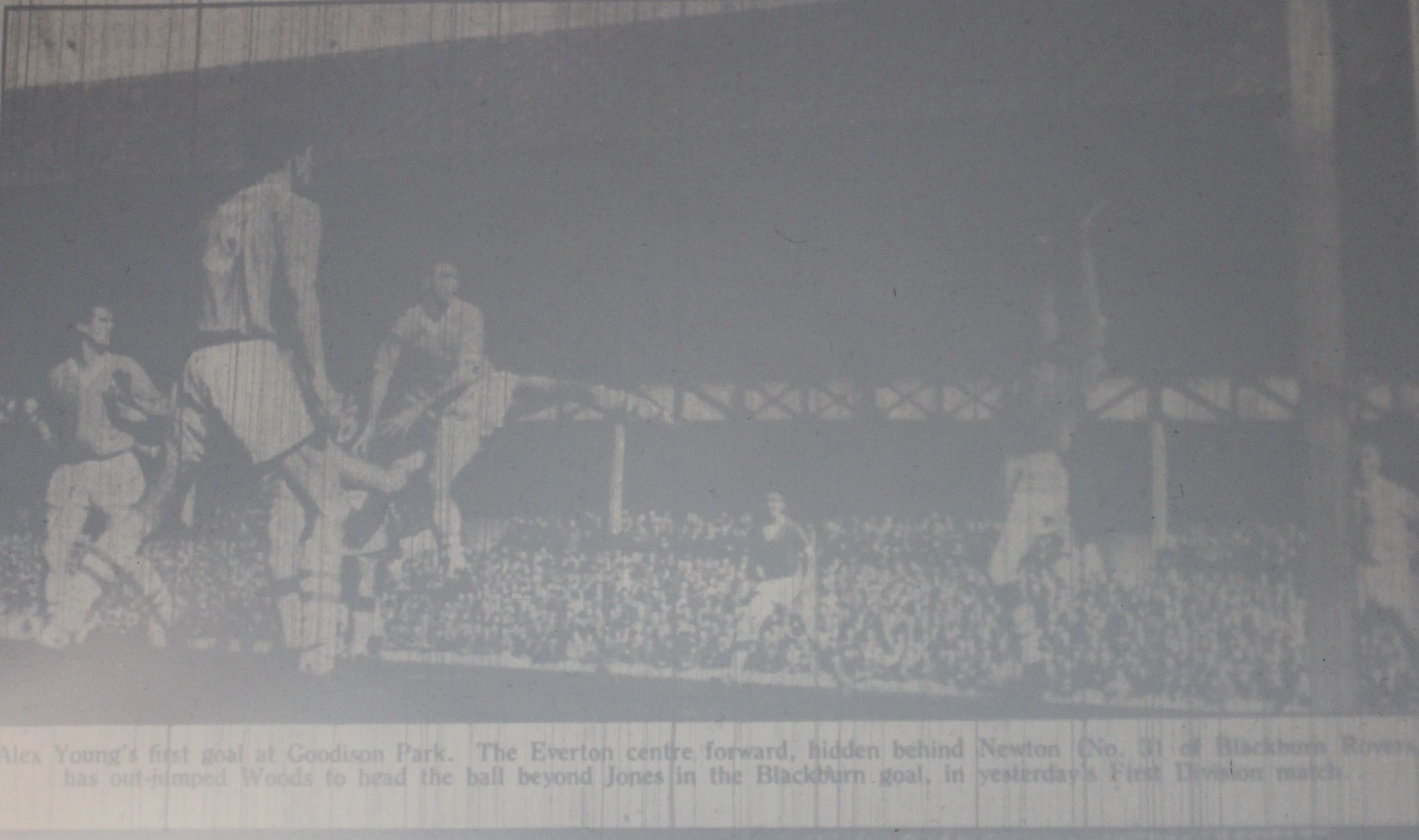 125 03.04.61 Young v B'burn (H) Alex Young (hidden behind the Blackburn left back) rises to m...webp