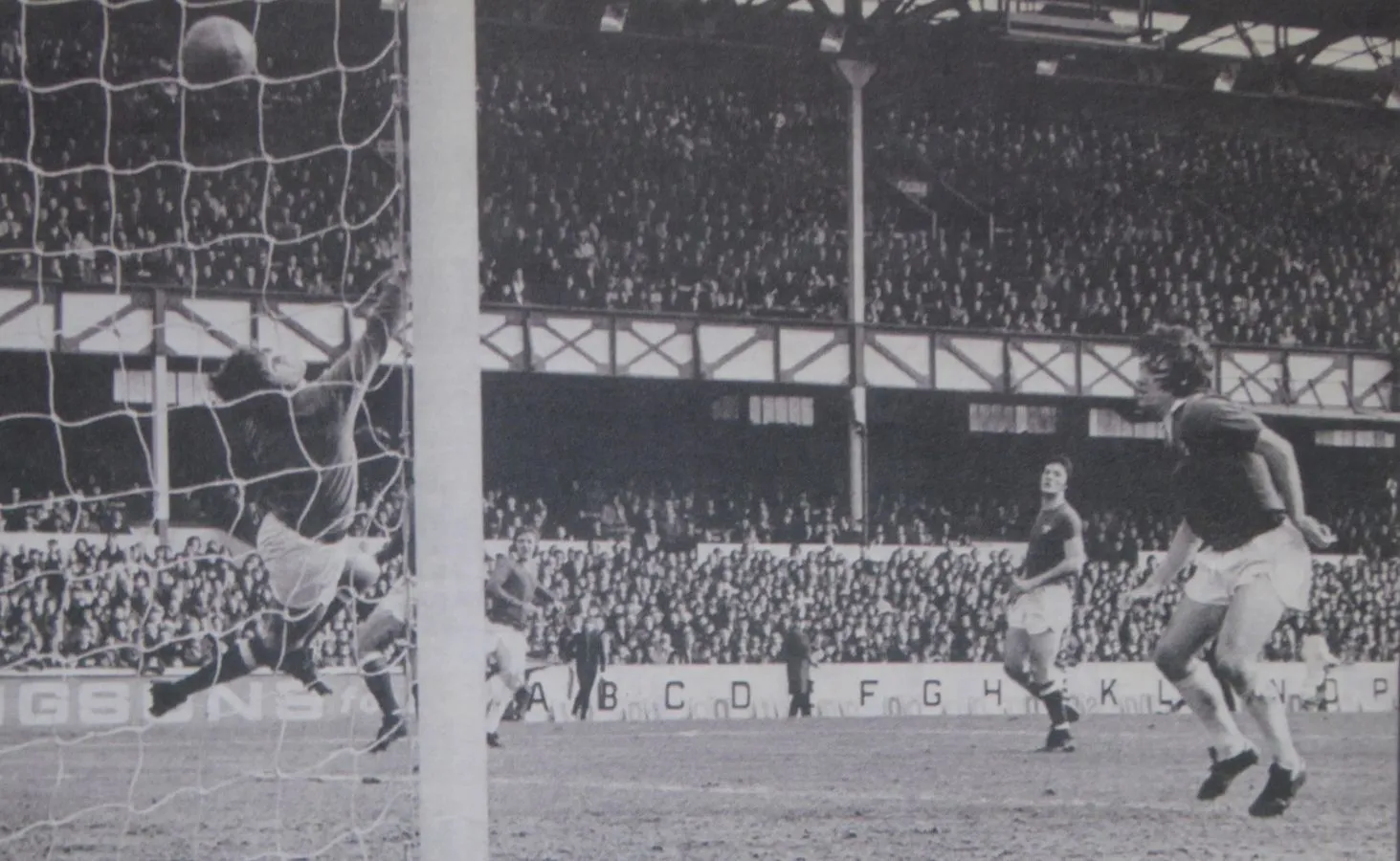 1982 23.03.74 Bernard v Chelsea (H) FIRST IN SEQUENCE - Mick Bernard watches as his shot beat...webp