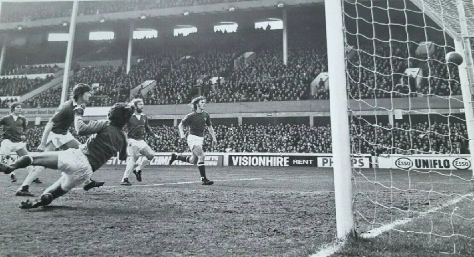 1984 23.03.74 Bernard v Chelsea (H) THIRD IN SEQUENCE - Gary Jones watches Mick Bernard's sho...webp