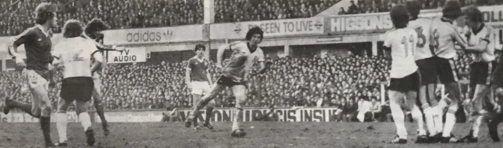 2559 08.03.80 Kidd v Ipswich (H) FA CUP  The Ipswich wall recoils as Brian Kidd fires home Ev...webp