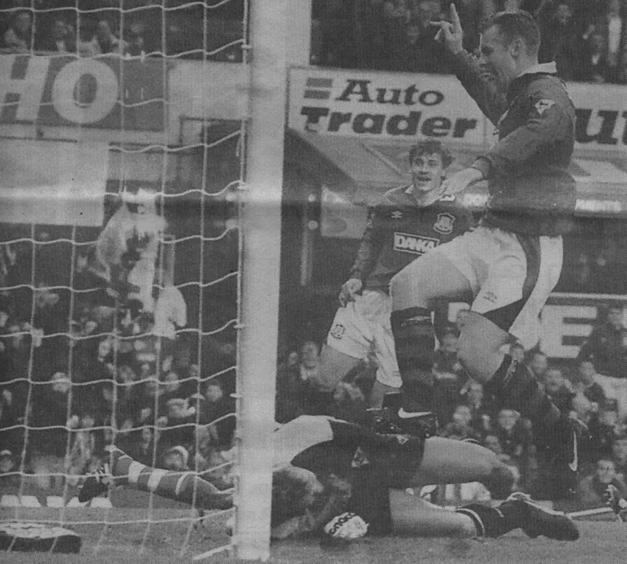 4172 16.11.96 Stuart v Southampton (H) Graham Stuart scores from close in to open the scoring...webp