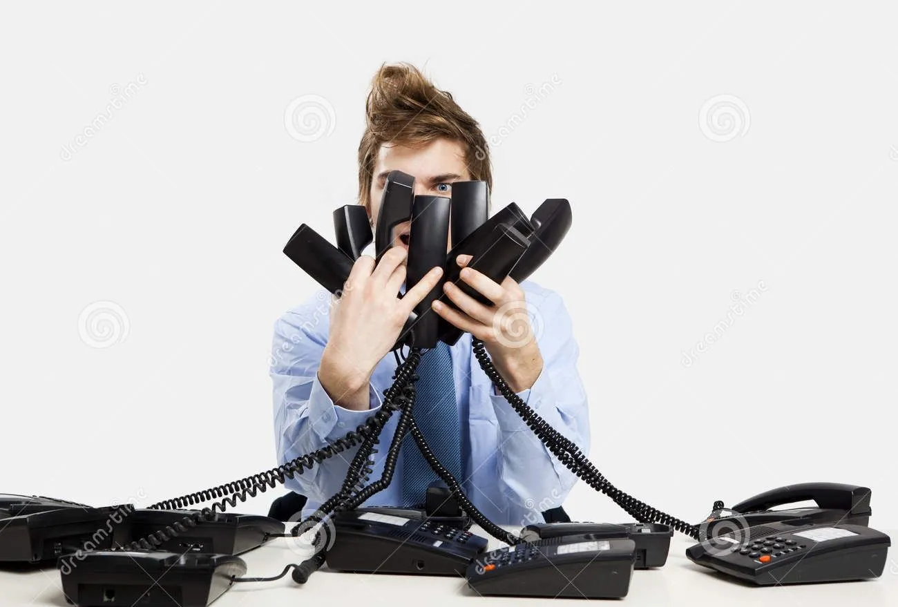 answering-calls-young-man-office-several-phones-same-time-36228342_edit_83482176966427.webp