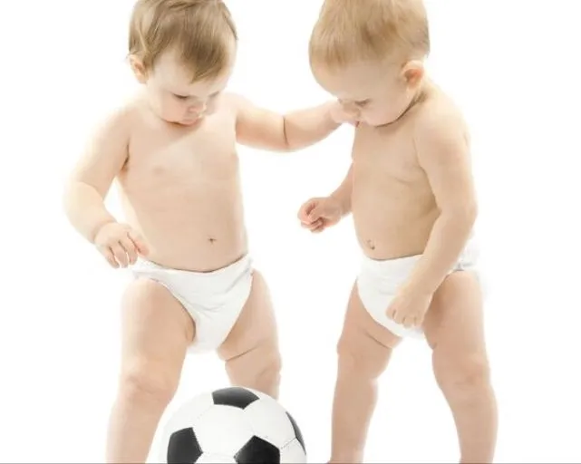 babies-playing-football.webp