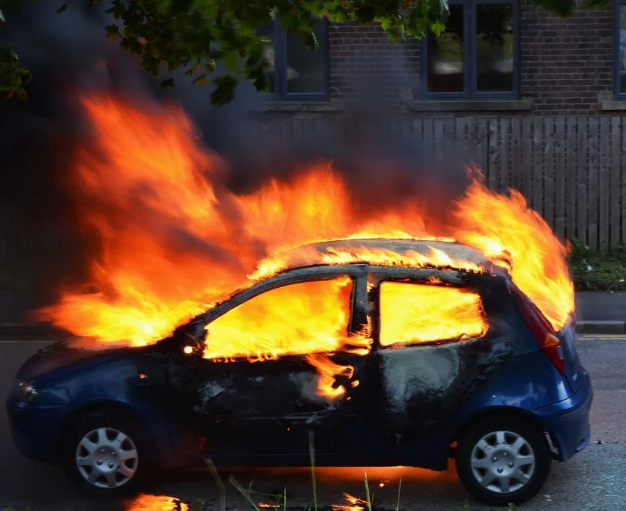 burning_car_by_promisebethonthesky-d5529zk.webp