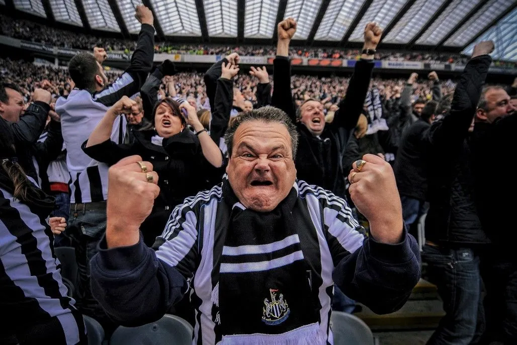 Newcastle-football-fans-celebrate_HD-e1418213196393.webp